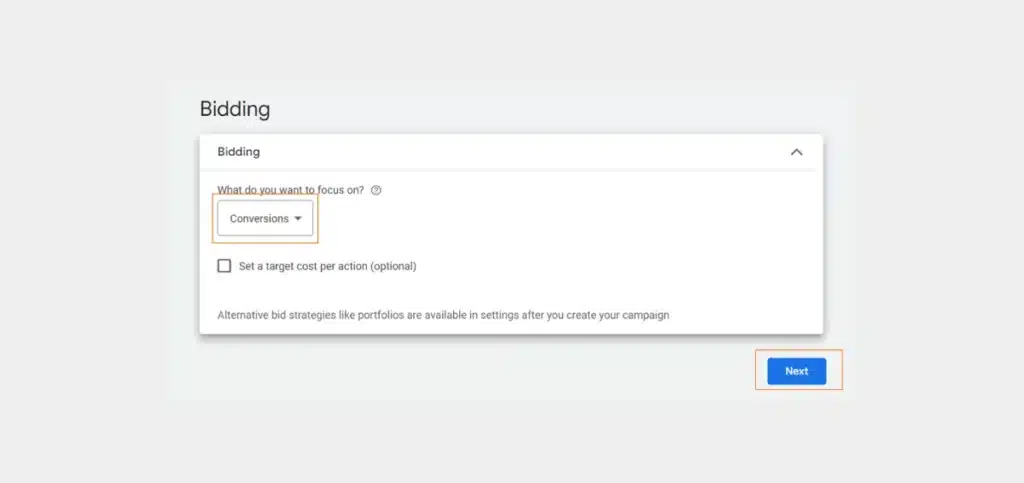 Next, choose a bidding strategy for your campaign. It can be conversions, clicks, or impression share. 